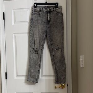 Woman’s grey distressed Jean.